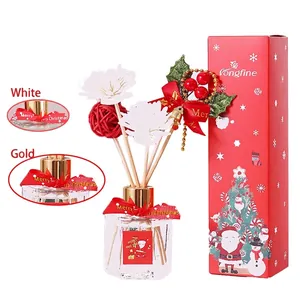 Christmas reed diffuser gift set with glass bottle, wood sticks and festive red box