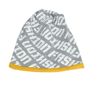 Detail of gray knitted beanie with yellow trim and white Fashion text print design