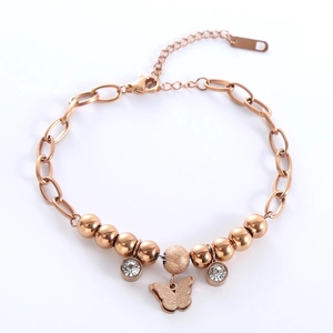 Rose gold bead bracelet featuring a matte butterfly pendant and sparkling zircon accents