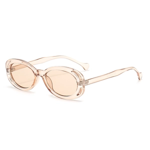 Fashionable oval hollow frame sunglasses in transparent champagne resin for street style