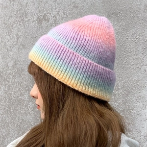 Chic rainbow gradient tie-dye knit beanie for women in a retro warm winter style