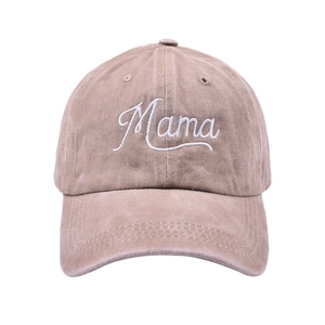 Close-up of white Mama script embroidery on washed cotton vintage baseball cap