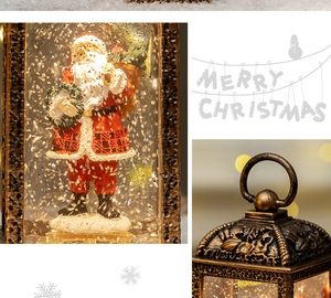 Close-up of bronze Christmas lantern showing a detailed Santa scene with swirling snow effect