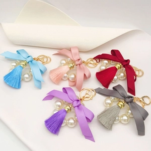 Fashion pearl wreath keychains with colorful ribbon bows and tassels in five soft colors