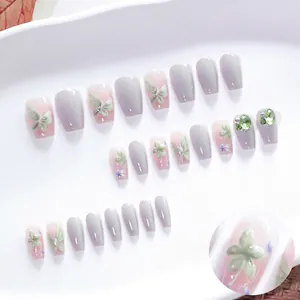 3D floral cat-eye press-on nails with butterflies and green rhinestones in short ballet style