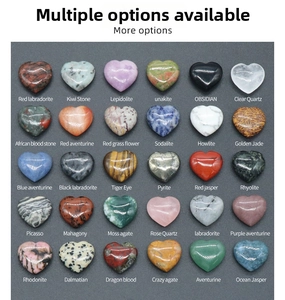 Detailed grid of thirty different natural heart-shaped gemstones in various colors