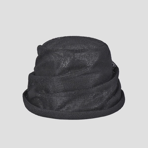 Close-up of lightweight black lace mesh bucket hat featuring pleated texture and chic brim