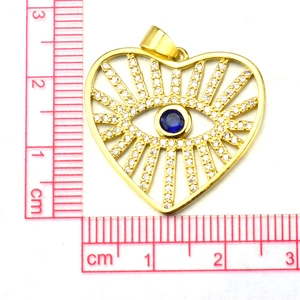 Golden heart tree cross pendant with blue zircon and size ruler scale measurement