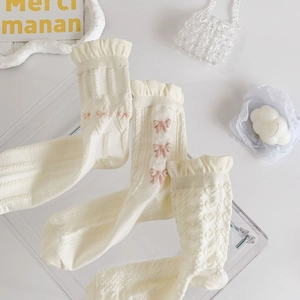 Detail of white cotton socks with lace trim and pink bow embroidery in JK Lolita style