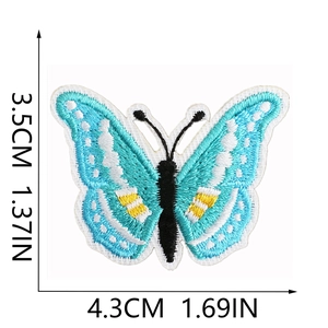 Detailed view of blue butterfly embroidery patch with size measurements in cm and inches