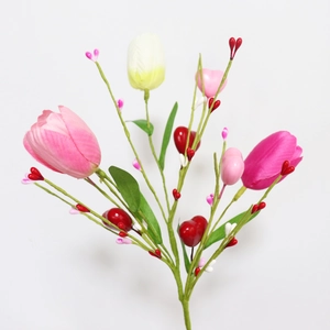 Detail of pink tulip bouquet with decorative heart-shaped berries for Valentine gift
