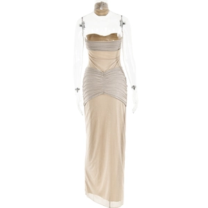 Detailed view of the champagne strapless evening gown with elegant ruching and glitter fabric