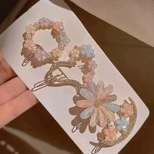 Floral hair clip set with resin daisy heart and moon shapes in soft pastel colors