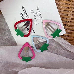 Set of four cute strawberry BB hair clips in red pink and blue for girls hair styling