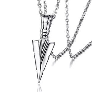 Macro view of silver hexagram arrow pendant with industrial geometric stripes and chain