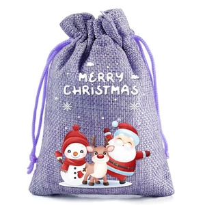 Detail of purple burlap Christmas gift bag with Santa and snowman drawstring closure