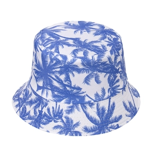Reversible bucket hat with navy palm tree prints for summer outdoor sun protection