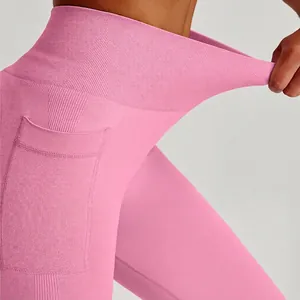 High-waisted pink yoga leggings for women with side pockets and high elasticity fabric