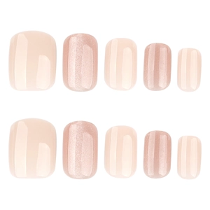 Faux ongles carrés courts rose nude avec paillettes œil de chat et fini brillant