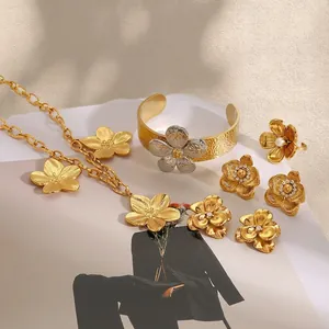 Elegant gold flower jewelry set with necklace bracelet and pearl ring for women