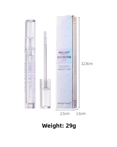 Close-up of shimmer lip gloss with glossy finish and star-patterned laser box packaging
