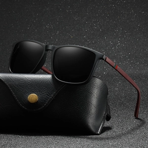 Polarized black square sunglasses with textured temples and premium leather case