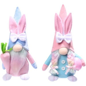 Pink and blue Easter gnome plush set with rabbit ears carrying carrot and egg