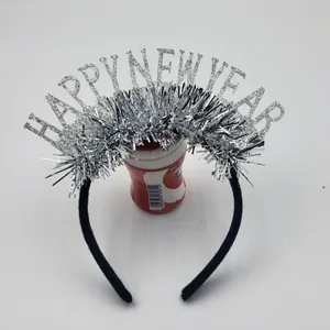 Detail of silver glitter Happy New Year headband with sparkling tinsel fringe for party