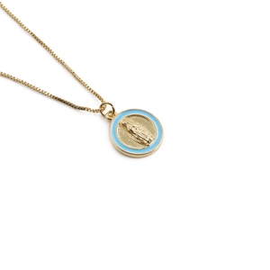 Golden coin necklace featuring a portrait relief and light blue enamel circular border