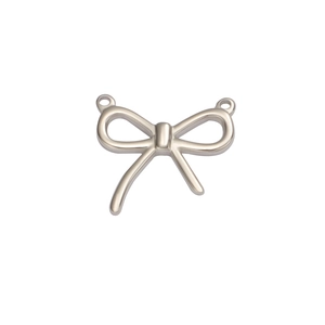 Detailed close-up of a silver bow-shaped titanium steel pendant for DIY jewelry design