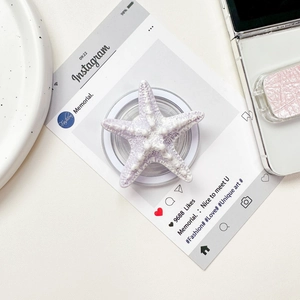 Detailed close-up of a light purple starfish phone socket with textured resin surface