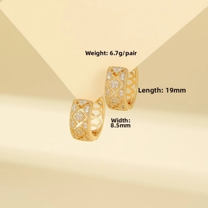 Detail view of geometric gold hoop earrings with zircon, size 19mm by 8.5mm