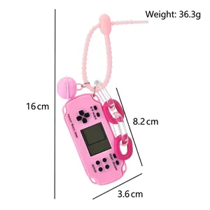 Pink retro Tetris game console keychain with silicone strap and dimension markers