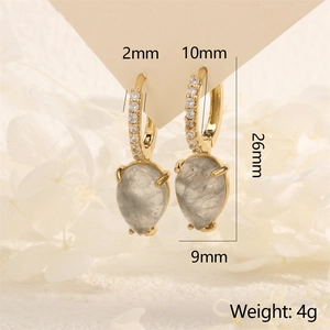 Detail of teardrop earrings with dimensions 26mm length and 4g weight in gold finish