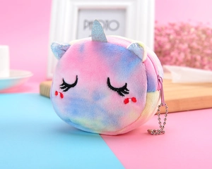 Detailed close-up of a plush unicorn coin purse with rainbow gradient fur and silver horn