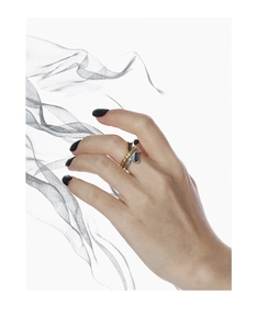 Detail of S925 silver rings set with purple rectangle zircons on female hand