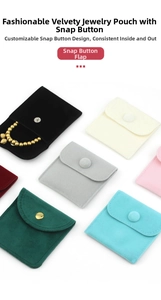 Flat lay of colorful velvet jewelry pouches with snap button closure on white background