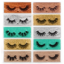 Detailed grid view showing 10 pairs of dense 3D eyelashes with colorful glitter backgrounds