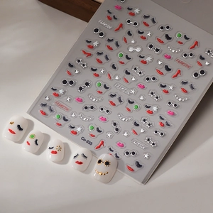 Detail of Co-335 nail stickers featuring fashion lips, eyelashes, and high heels
