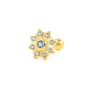 Detail of snowflake stud earring with blue stones and screw back in gold finish