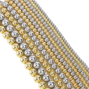 Golden and silver hollow metal beads in various sizes for DIY jewelry making