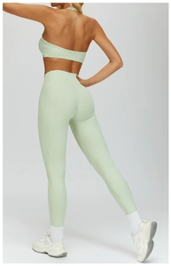 Rear view of mint green high waist yoga leggings with scrunch butt lift and soft fabric