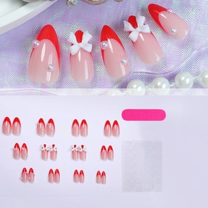 Set unghie finte mandorla rosse French con fiocchi, perle, colla e limetta