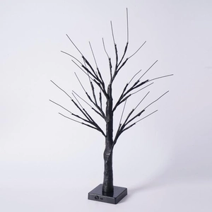 Detail of LED birch tree lamp black branch texture with stable square base and power port