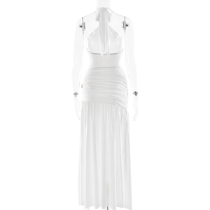 Detailed back view of white backless halter dress with elegant ruching and slit