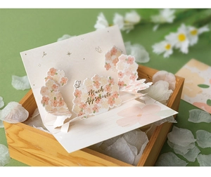 Detail view of a 3D floral pop-up card with Much Appreciate text and writing area