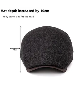 Detail view of dark grey herringbone newsboy hat with a 10cm depth specification
