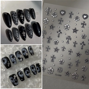 Gothic nail art stickers with metallic gold cross and star designs for punk manicure