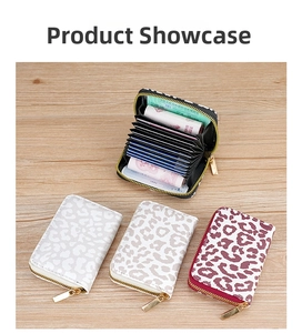Detailed accordion card holder with leopard print patterns and gold zipper closure