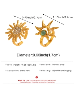 Detail of adjustable golden sunflower rings with green opal and sparkling crystals